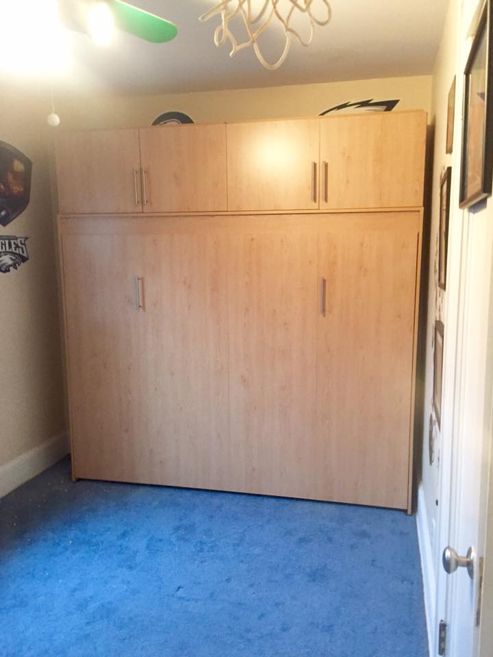 Queen size Closet or Murphy Bed with cabinets on top.