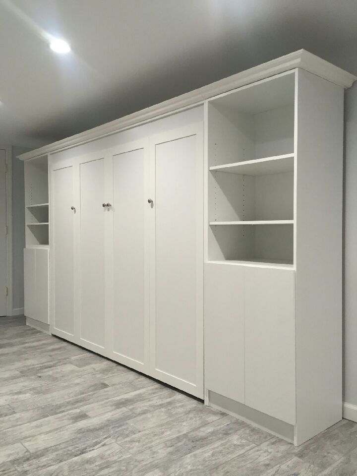 Queen size Horizonta Murphy Bed with raised panels and custom crown molding and cabinetry