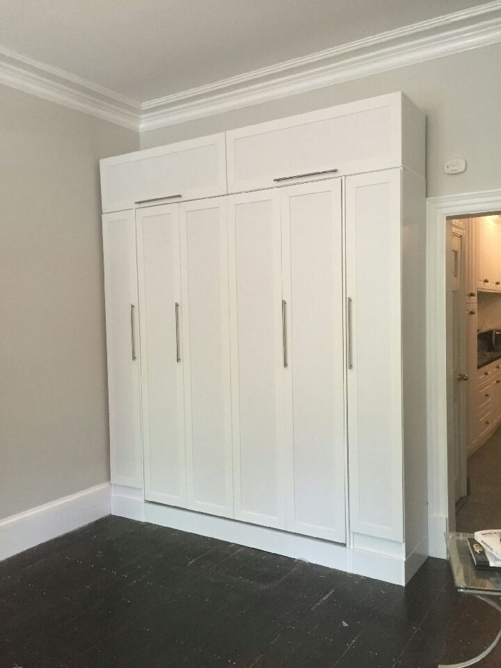 Queen size Murphy bed with custom hutch + bookcases on podium with raised panel