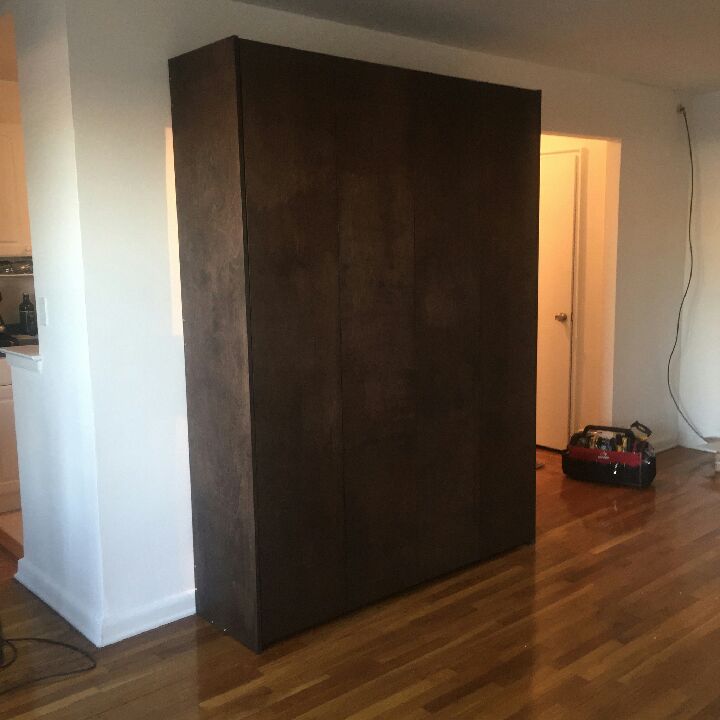Vertical Queen sized Murphy Bed in a Stained Wood Vaneer finish